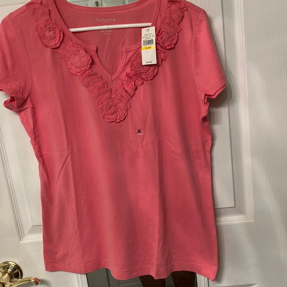 VanHeusen pink keyhole neckline with floral around entire neckline.